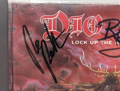 DIO Lock Up the Wolves CD Signed By RONNIE JAMES And ROWAN