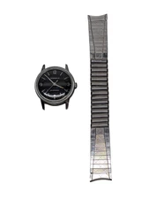 Vintage 1960's Caravelle by Bulova Mens Watch M7 black face automatic