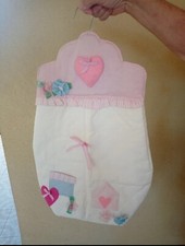 porta pannolini da appendere con applicazioni 