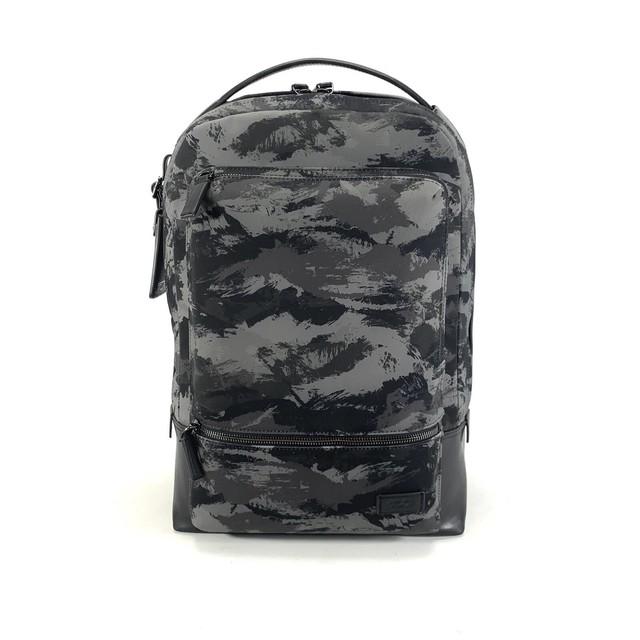 tumi gray backpack