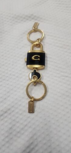 Coach padlock & key black and gold Keychain purse charm