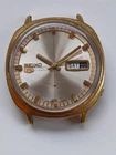 Seiko 5 automatic 21 Jewels 6119 silver sunburst dial running.