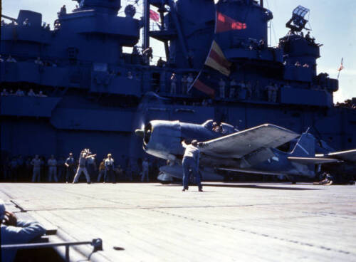 On aircraft carrier USS Yorktown F6F Hellcat fighter pilot readies- Old Photo - Picture 1 of 1