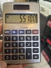 RadioShack pocket dual power calculator featuring a metallic silver finish.