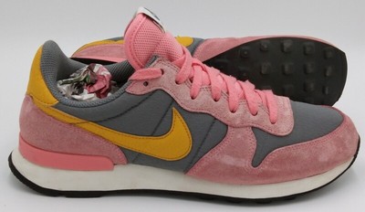 nike black and gold internationalist trainers