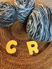 Knit Picks Stroll Fingering in black/greys/aqua x 1.5 skeins