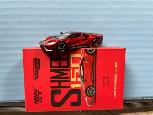 1/64 TARMAC WORKS MINI GT SHMEE FORD GT LIQUID RED & GOLD STRIPES - Picture 3 of 9