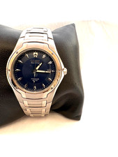 Citizen Mens Titanium Eco Drive Calendar 100 MT WR Bracelet watch E111-K002141