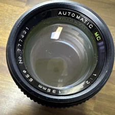 Hanimex Automatic 135mm  F2.8  Minolta MD mount telephoto lens Exc. cond.