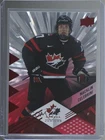 2024 Team Canada Juniors Outburst Red 16/25 Macklin Celebrini #11 Rookie RC