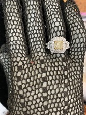 14K Cushion Cut Canary 1.23 Yellow Diamond Ring with 2ctw side stones.