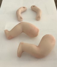 PORCELAIN ONE PAIR OF 1 1/2 ARMS AND 2 LEGS.