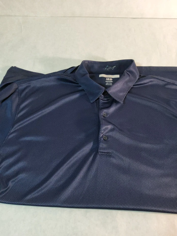 Camisa polo de golf Greg Norman Play Dry ML75 azul geométrica XXL manga corta para hombre Foto 2 de 3