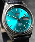vintage seiko 5 automatic day date movemvent no. 7009A japan made men's watch.