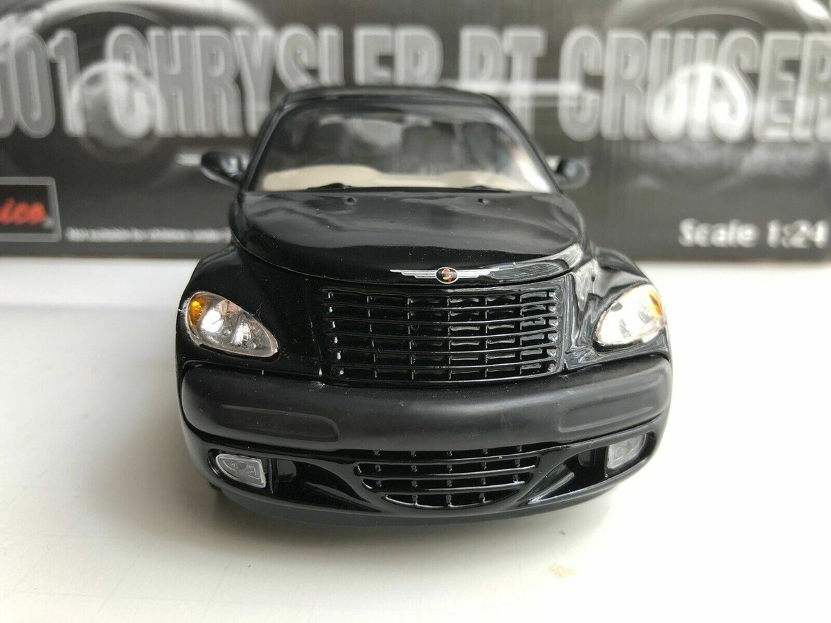 ONE OF SAICO 2001 CHRYSLER PT CRUISER 1:24 DIECAST MODEL CAR