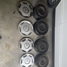 4 Mercedes 124E Stahlfelgen mit Radkappen 6,5 Jx15H ET 49