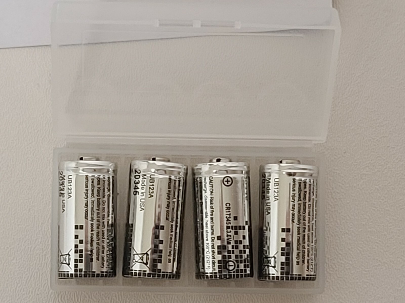 ULTRALIFE CR123A SET OF 4 MADE IN THE USA PLUS PLASTIC CASE FIT 4 BATTERIES