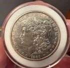 1889 Morgan Silver Dollar 90% AU/BU Light Golden Toning On Edge