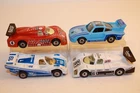 Four (4) Vintage 1980's - 1990's Matchbox / Maisto Racing Cars PORSCHE / SAUBER