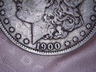 1900-O Morgan Silver Dollar, Metal Under Chin, “ Rat Tail “ — photo 3