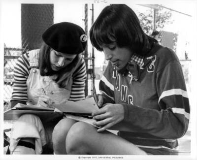 Didi Conn and Sherry Hursey writing on a book in 'Almost Summer', 1 Old Photo