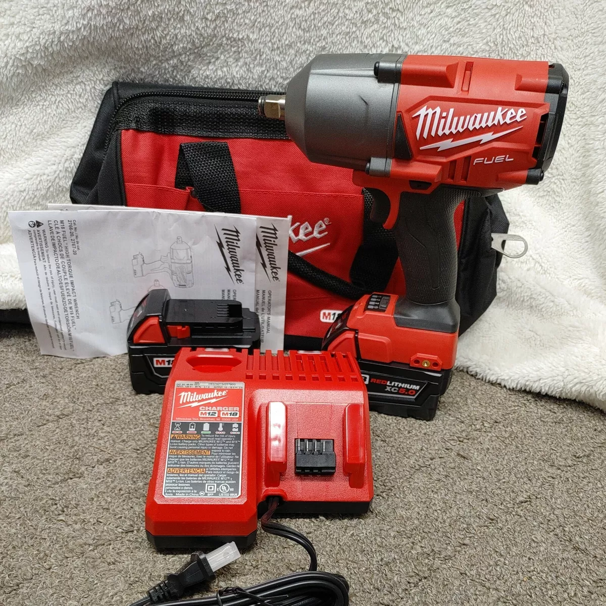 Milwaukee M18 FUEL 18-Volt Lithium-Ion Brushless Cordless 1/2 in. Impact  Wrench with Friction Ring Kit with One 5.0Ah Batteries