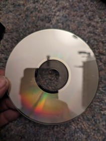 Heart of the Alien (SEGA CD) case and manual. Disc is damaged