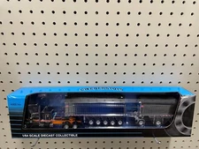 1/64 DCP Blk Sapphire Effect/Org/Chm Peterbilt sleeper Chrome East Genesis  II