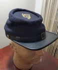 Reproduction Civil War Union kepi with musician's harp on top.