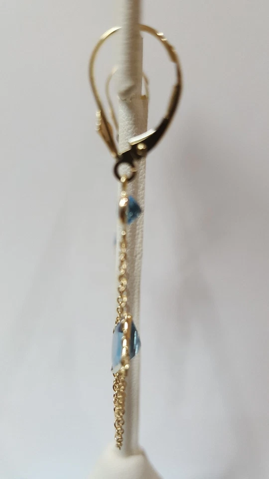 Pendientes de oro amarillo de 14k con piedra de topacio azul. Foto 3 de 4