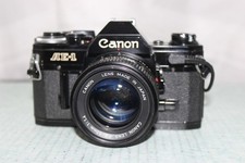  Exc2 Canon AE-1 SLR 35mm Film Black Camera Body w/50mm f/1.4 Lens From Japan