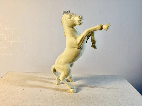 Marx  60mm 1950's rearing cream colored horse as shown.