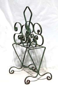 Authentic 1930s sage green wrought iron magazine stand -also holds cookie sheets