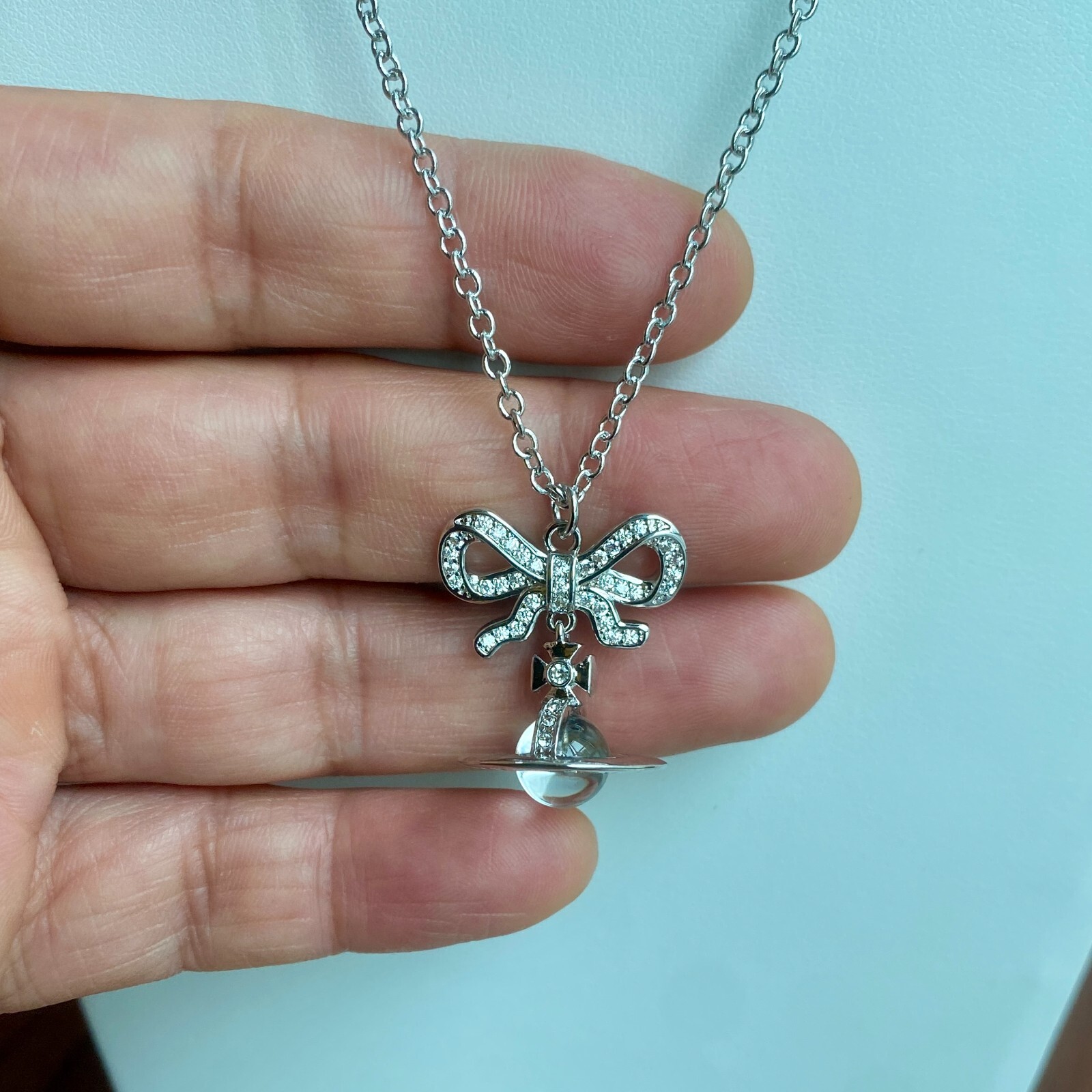 Vivienne Westwood Octavie Pendant Necklace 3D Orb Elegant Bow - Main Image