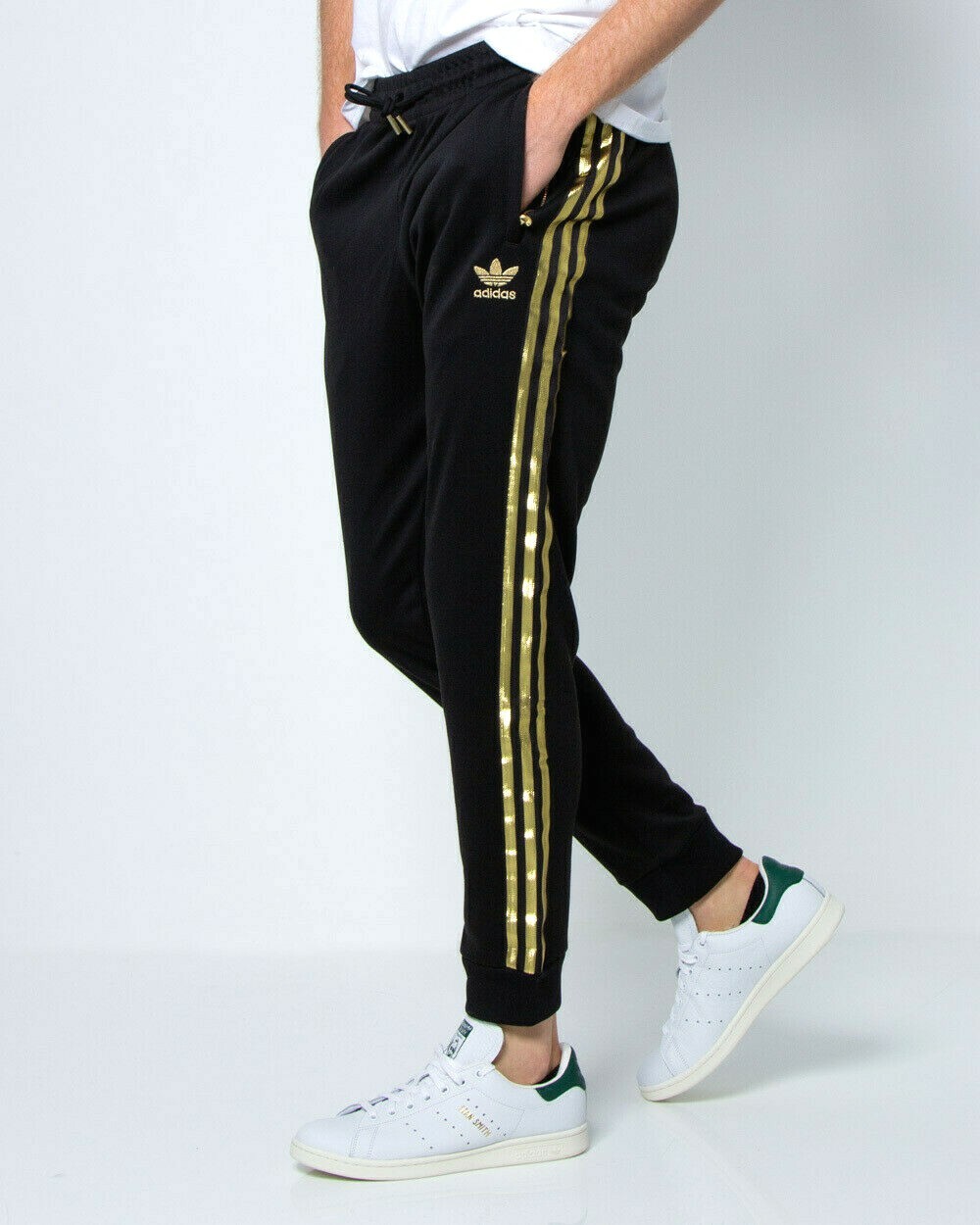 adidas superstar track pants black gold