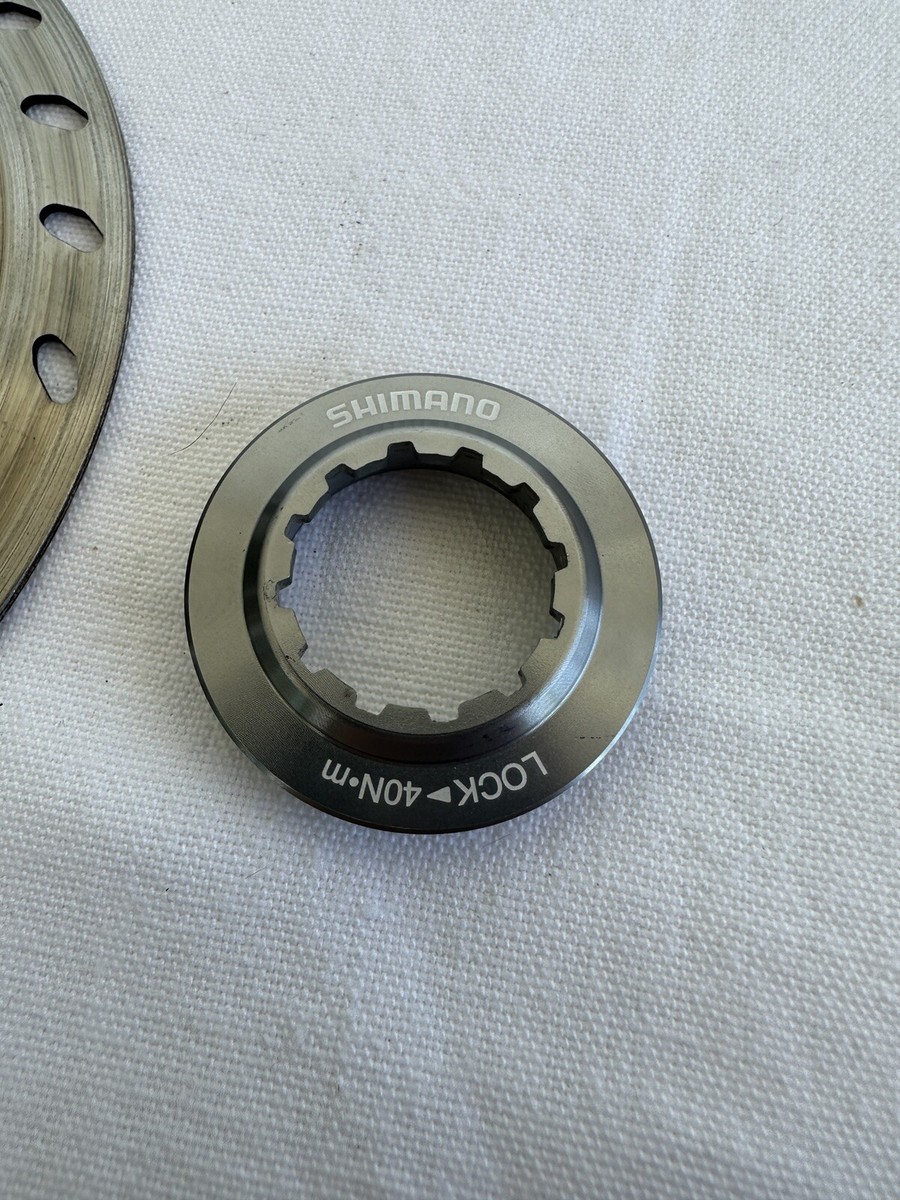 Rotore Shimano RT70 Rotore del freno a disco 140mm 160mm 180mm 203mm Rotori dei freni a disco Cenetr Lock Consegnano un potente anello di bloccaggio 18 Rotore Shimano RT70 Rotore del freno a disco 140mm 160mm 180mm 203mm Rotori dei freni a disco Cenetr Lock Consegnano un potente anello di bloccaggio 18