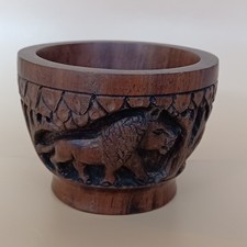 Small Wooden Bowl  with carved African animals rhino lion elephant on the sides