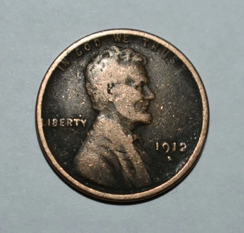 119d. A 1912 S LINCOLN WHEAT CENT / AS SHOWN, GOOD W/ ENVIRONMENTAL BUILD UP