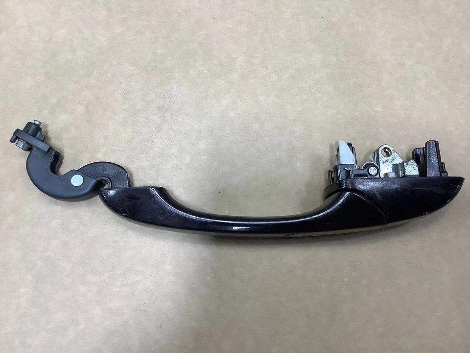 Volkswagen Routan 2010 manija de puerta exterior trasera izquierda lado del conductor negra OEM+ Foto 2 de 4