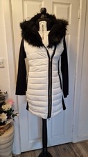 Frank Lyman Size 12 Black And White Padded Coat With Jersey Arms And Split Hood