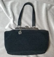 The SAK Black Crochet Lined Silver Tone Clasp Top Handle Hang Tag Micro Evening