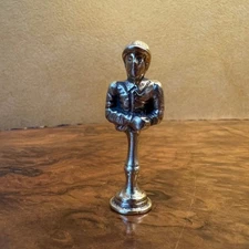 Vintage Brass Man Folding Arms Pipe Tamper