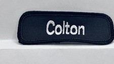 COLTON USED EMBROIDERED  SEW ON NAME PATCH TAGS ASSORTED WHITE ON BLACK