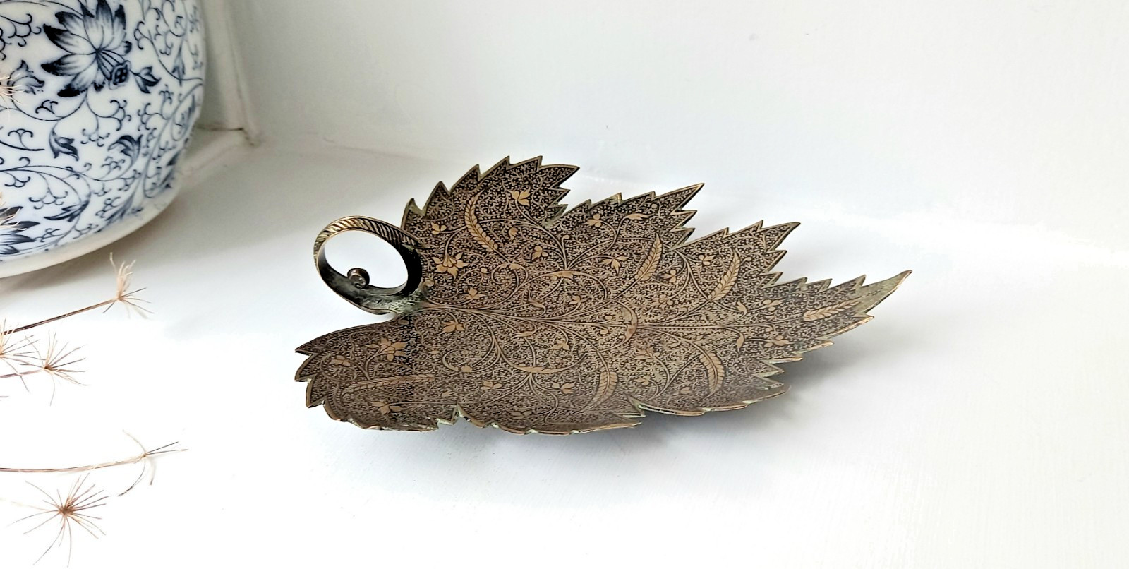 Antique Kashmiri brass sweetmeat dish in the shape of a Chinar leaf, scroll hand