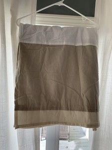 beige crib skirt