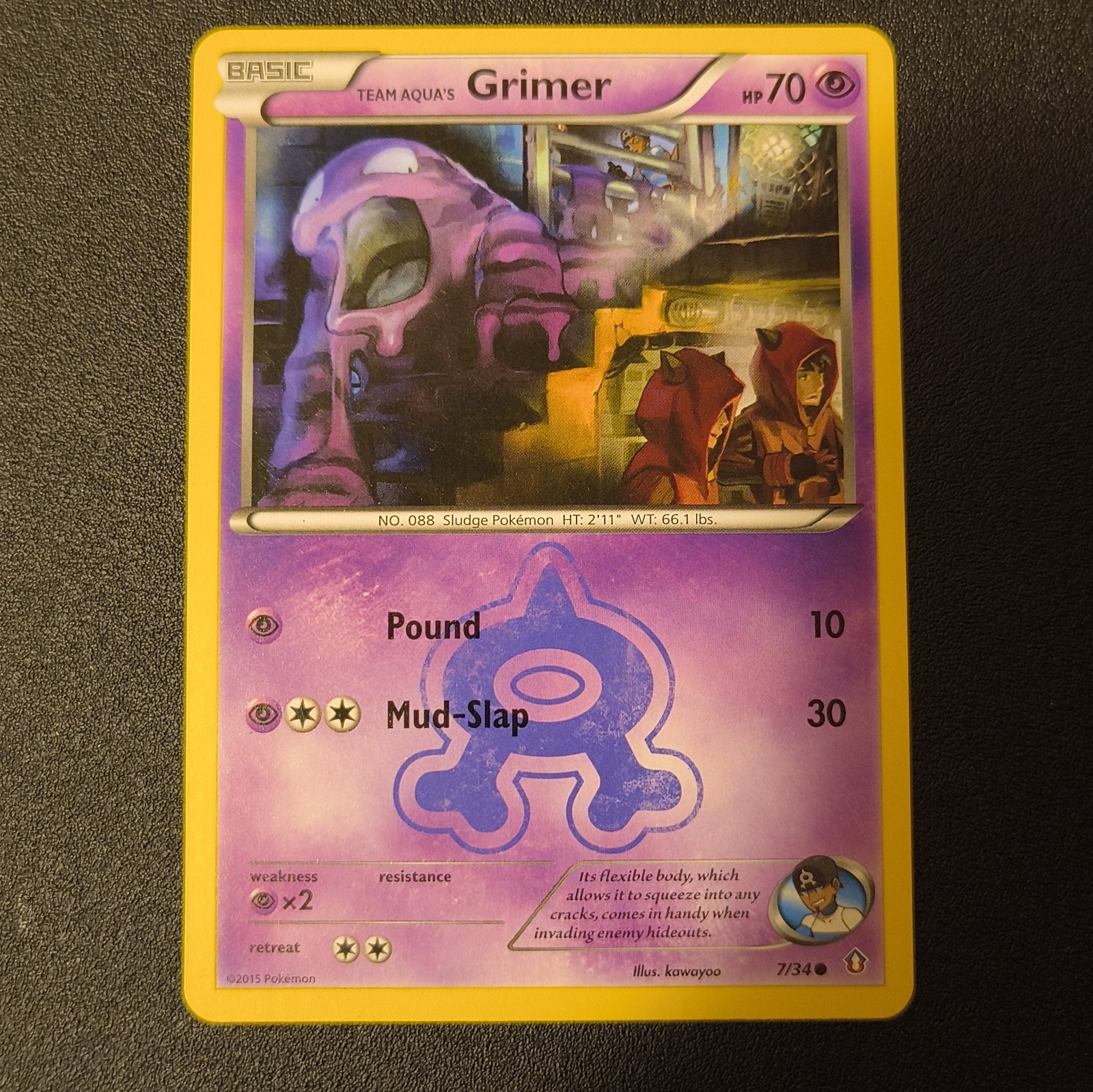 Team Aqua's Grimer 7/34 Double Crisis Regular LP