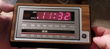 Vintage GE 7-4601A General Electric Alarm Clock AM/FM Radio Woodgrain TESTED