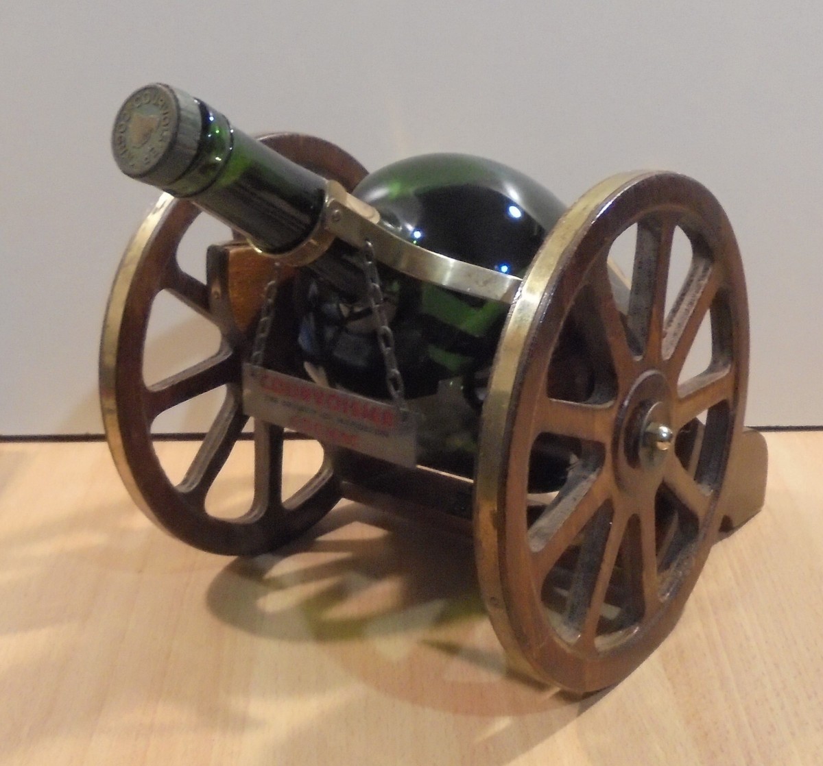 VSOP COURVOISIER NAPOLEON COGNAC VTG BOTTLE ON WOODEN CANNON BASE