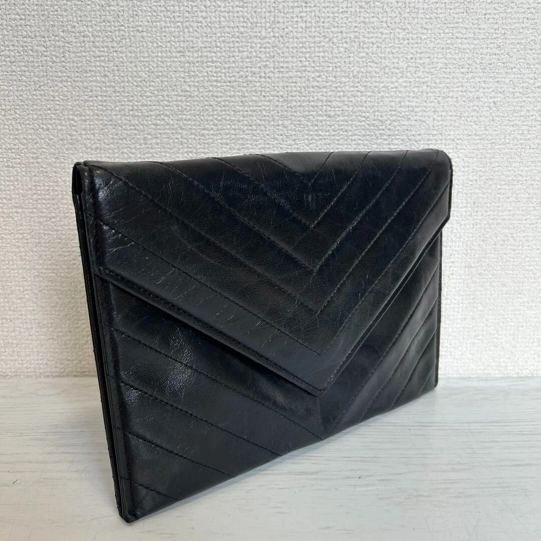 SAINT LAURENT (YSL) Pochette YSL Saint Laurent in pelle trapuntata nera busta pochette 24 5 cm usata