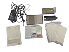 Canon Selphy CP510 photo printer with post cards open box